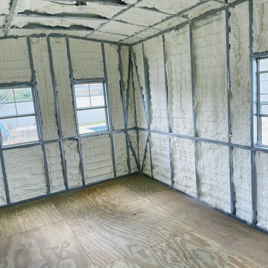 Closed-cell spray foam insulation applied to wall cavities in a residential project in Mesquite